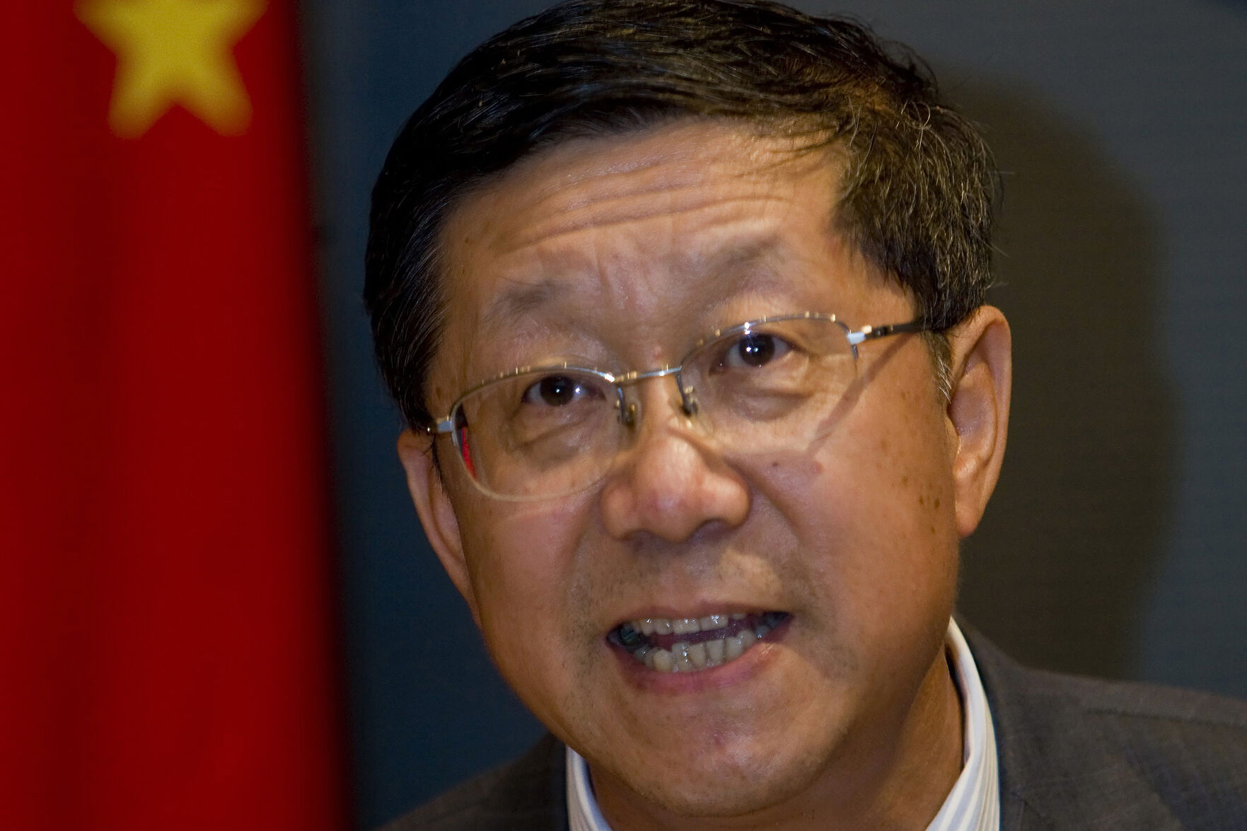 <p>FILE - Tang Shuangning, then chairman of China Everbright Group and Everbright Securities Co., talks to the press after the IPO for Everbright Securities at Shanghai Stock Exchange in Shanghai, China on Aug. 18, 2009. (Chinatopix via AP, File)</p>   PHOTO CREDIT: Chinatopix via AP