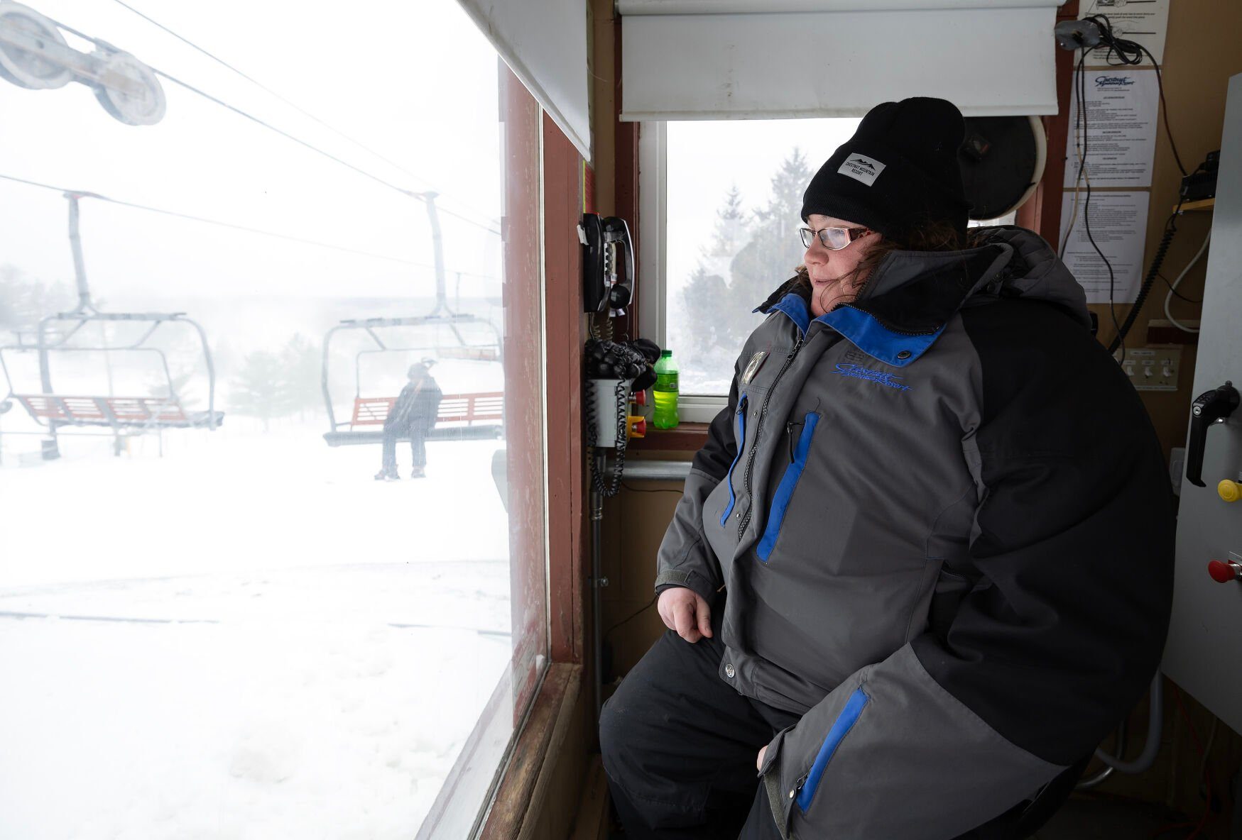 Kendra Sills operates a ski lift at Chestnut Mountain Resort near Galena, Ill., on Thursday.    PHOTO CREDIT: Gassman