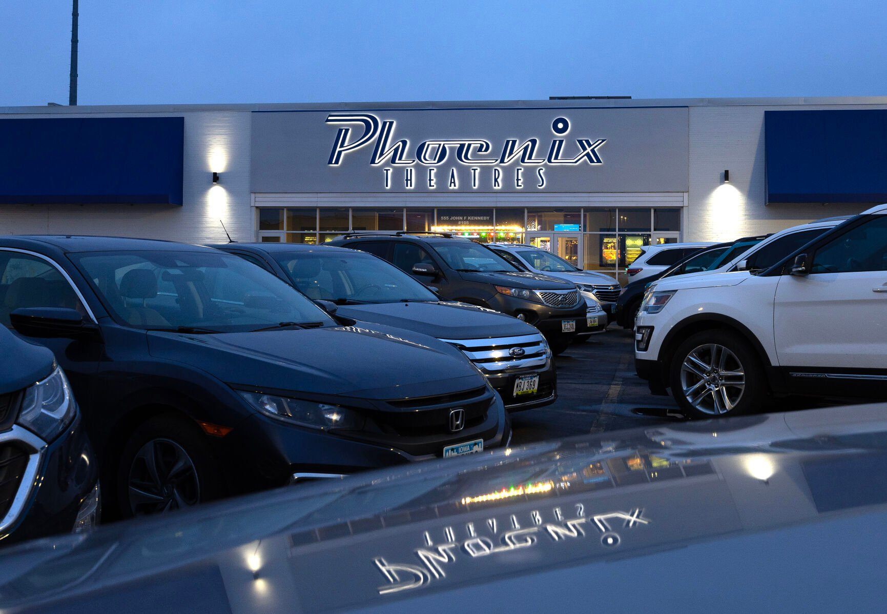 Cars fill the parking lot at Phoenix Theatres in Dubuque on Tuesday.    PHOTO CREDIT: Stephen Gassman