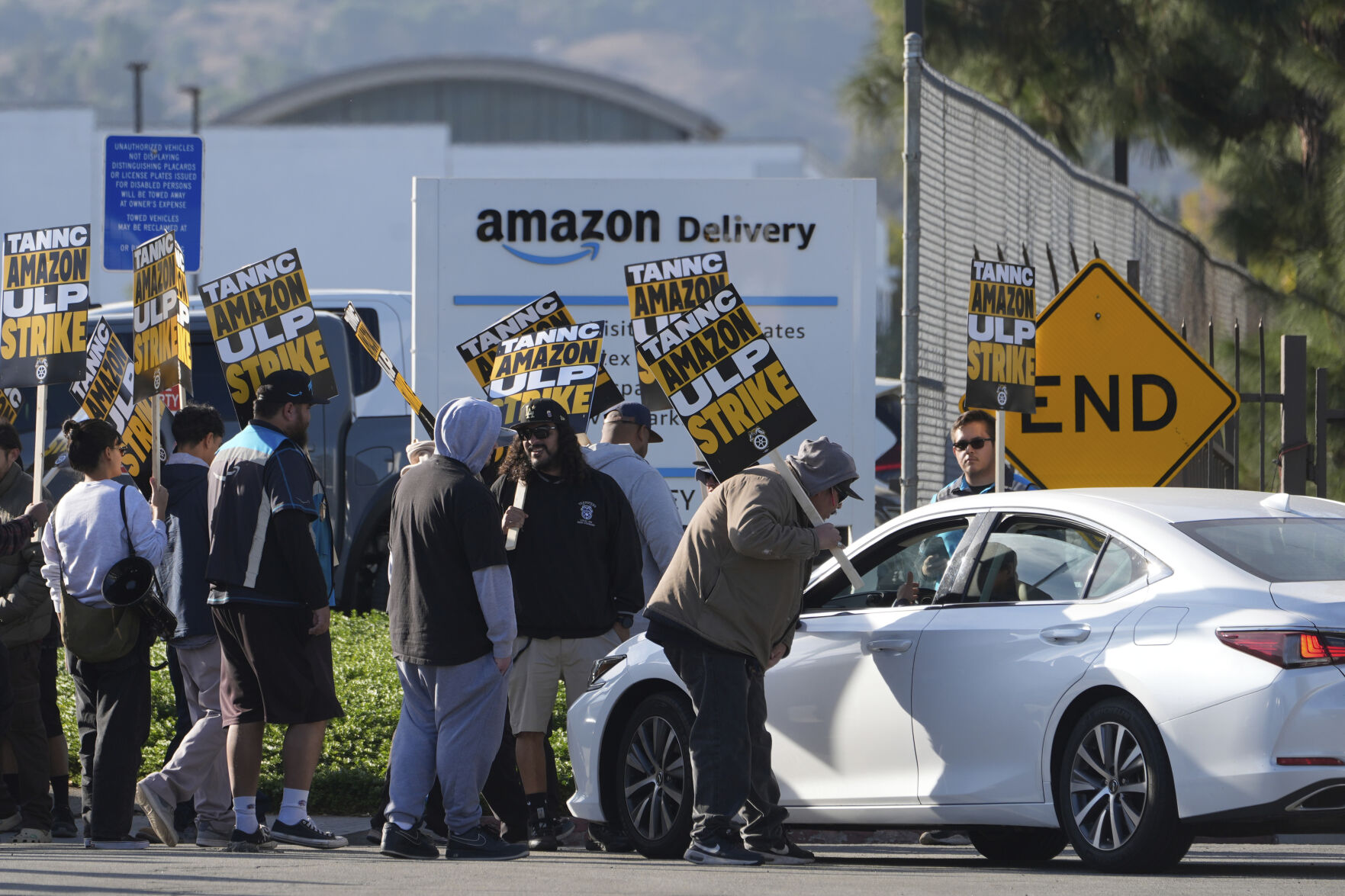 <p>Amazon workers, on strike, picket outside an Amazon Fulfillment Center, Thursday, Dec. 19, 2024, in City of Industry, Calif. (AP Photo/Damian Dovarganes)</p>   PHOTO CREDIT: Damian Dovarganes - staff, ASSOCIATED PRESS