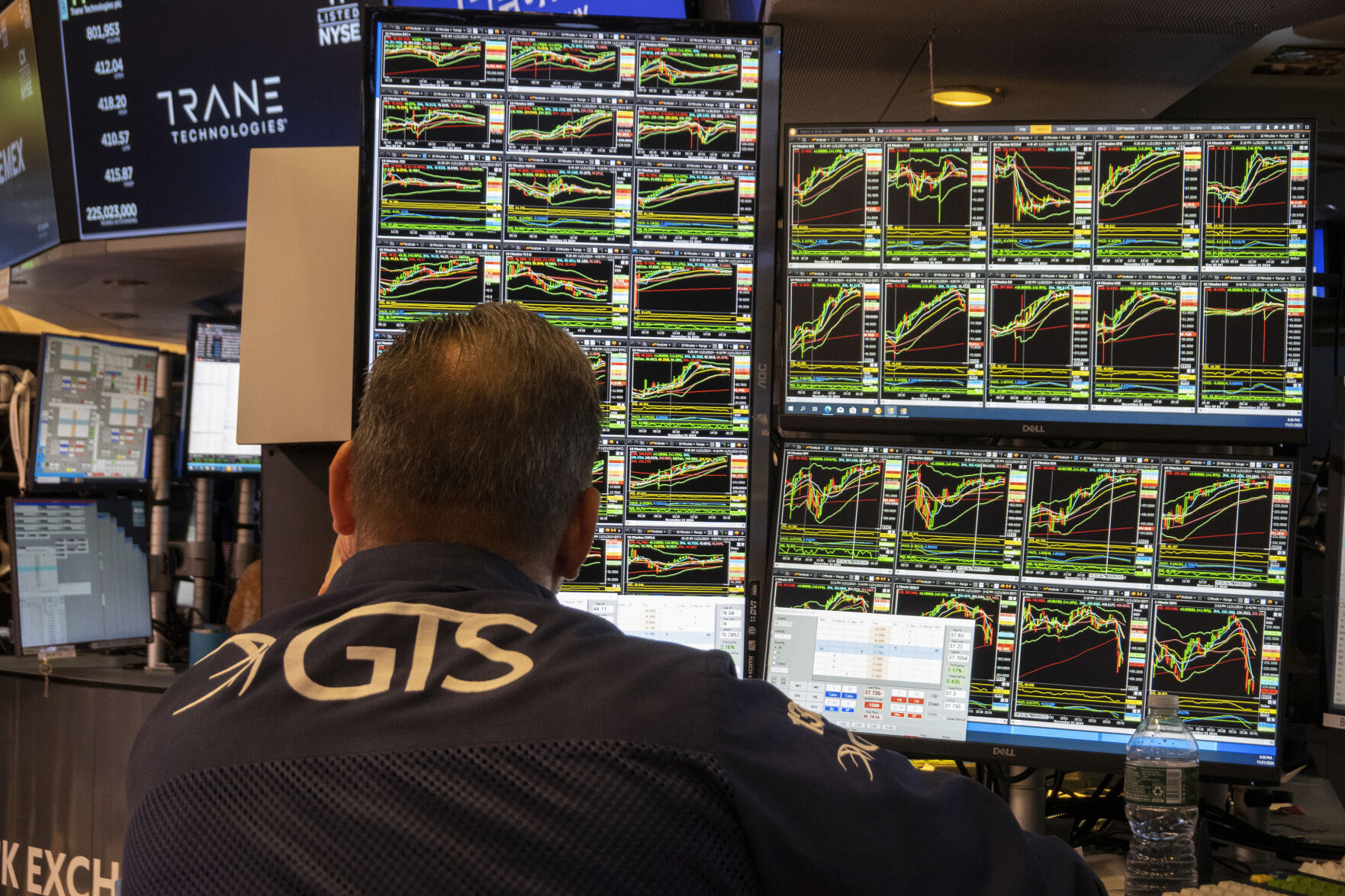 <p>FILE - A specialist studies monitors on the New York Stock Exchange trading floor in New York on November 21, 2024. (AP Photo/Ted Shaffrey, File)</p>   PHOTO CREDIT: Ted Shaffrey 