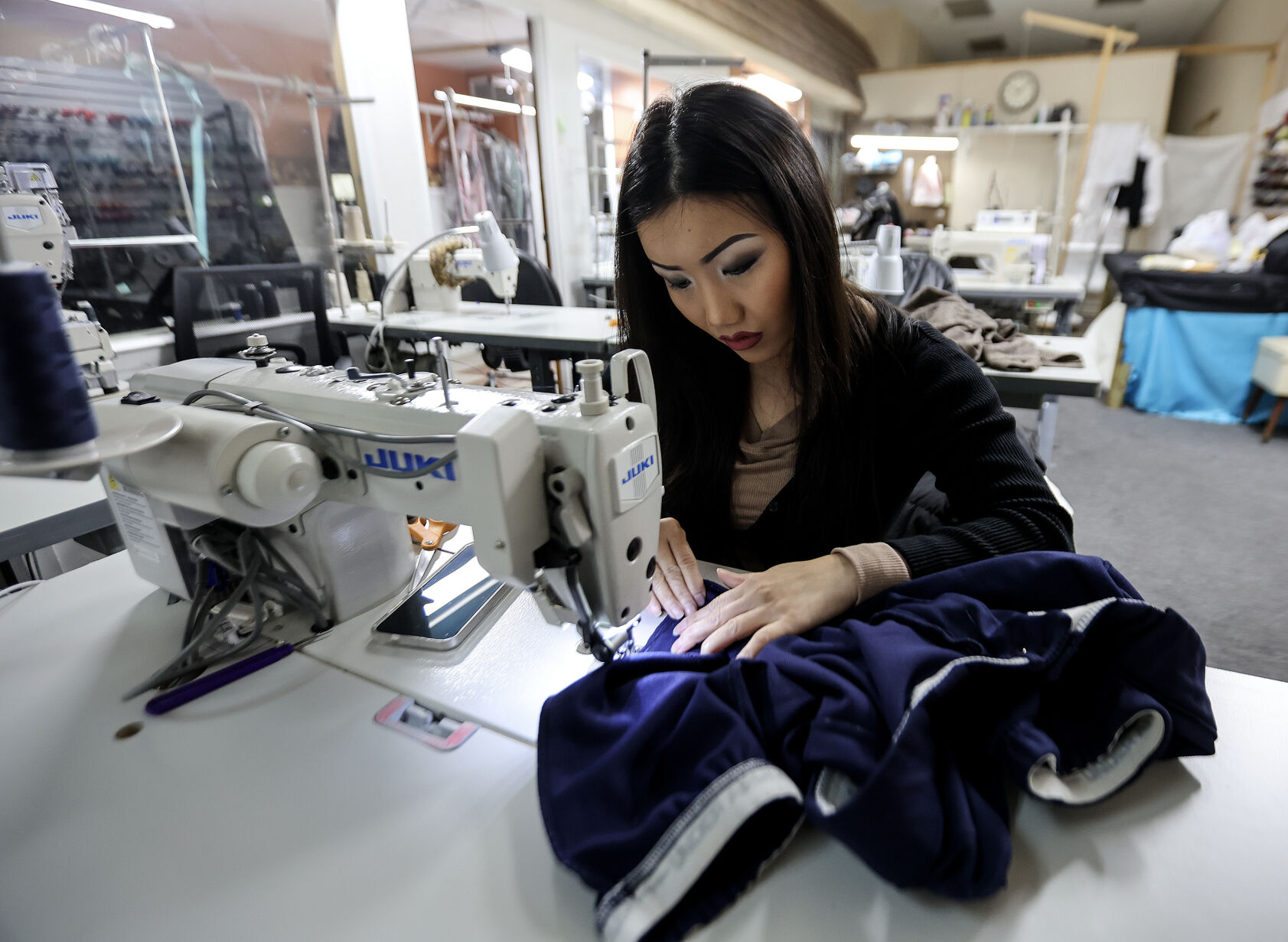 Six years ago, Xai Xiong and her husband opened Suns Alterations. “I love to help somebody that doesn’t know how to fix their clothes, so I can help them to make it right for them,” she said.    PHOTO CREDIT: Dave Kettering
Telegraph Herald