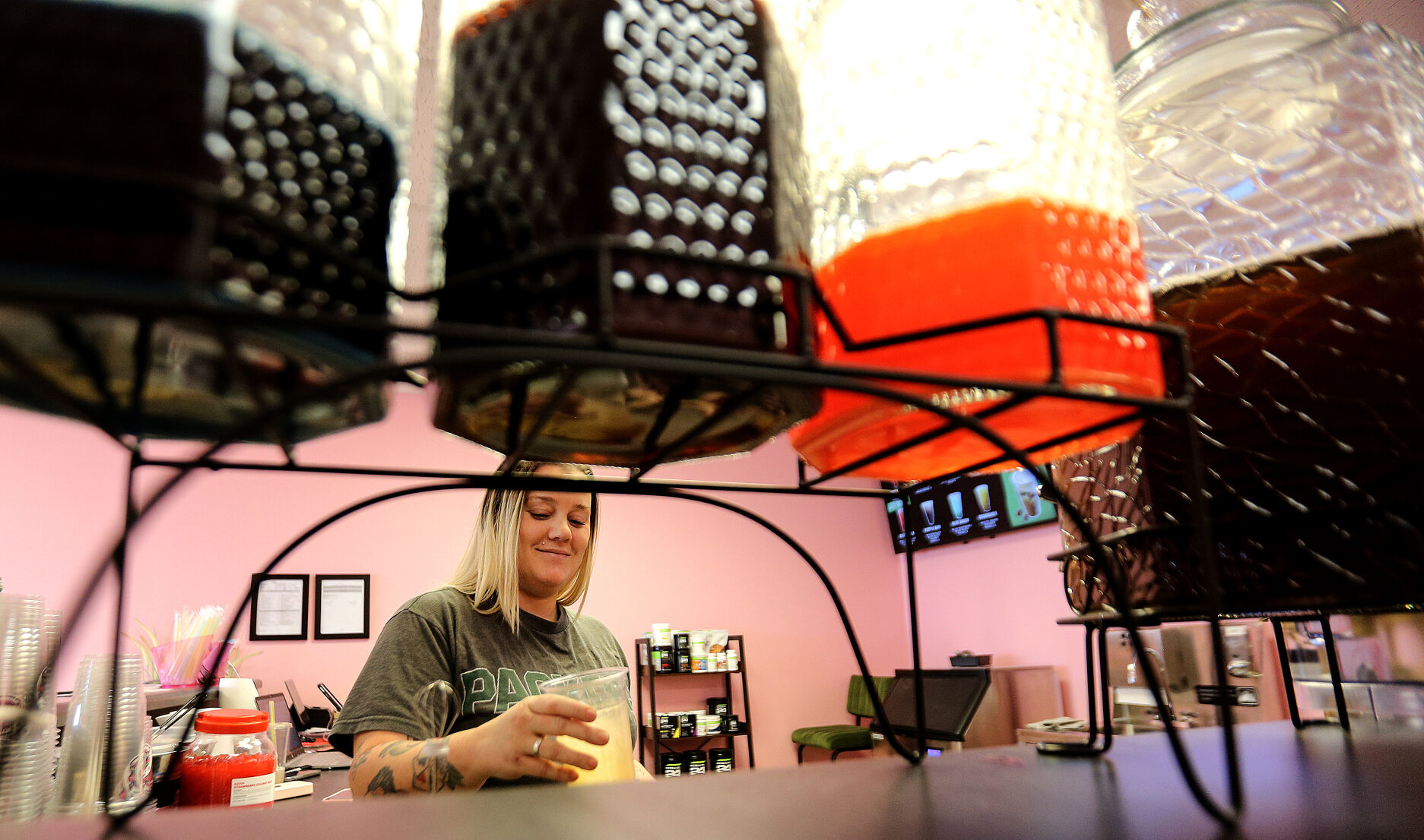 Owner Amber Feldman makes a drink at Feldman Nutrition in Asbury on Thursday, Jan. 2, 2025.    PHOTO CREDIT: Dave Kettering