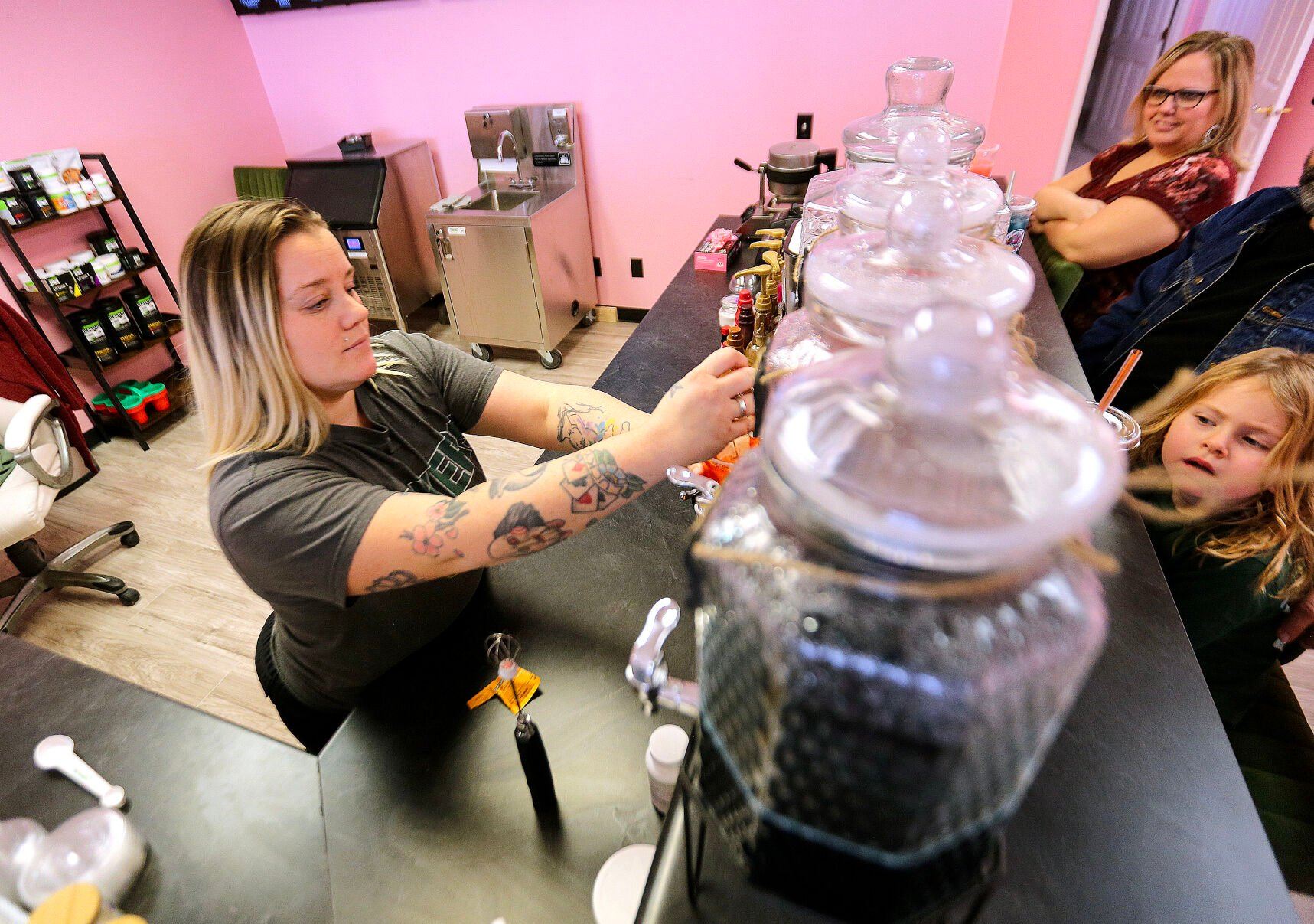 Owner Amber Feldman makes a specialty drink at Feldman Nutrition on Thursday.    PHOTO CREDIT: Dave Kettering