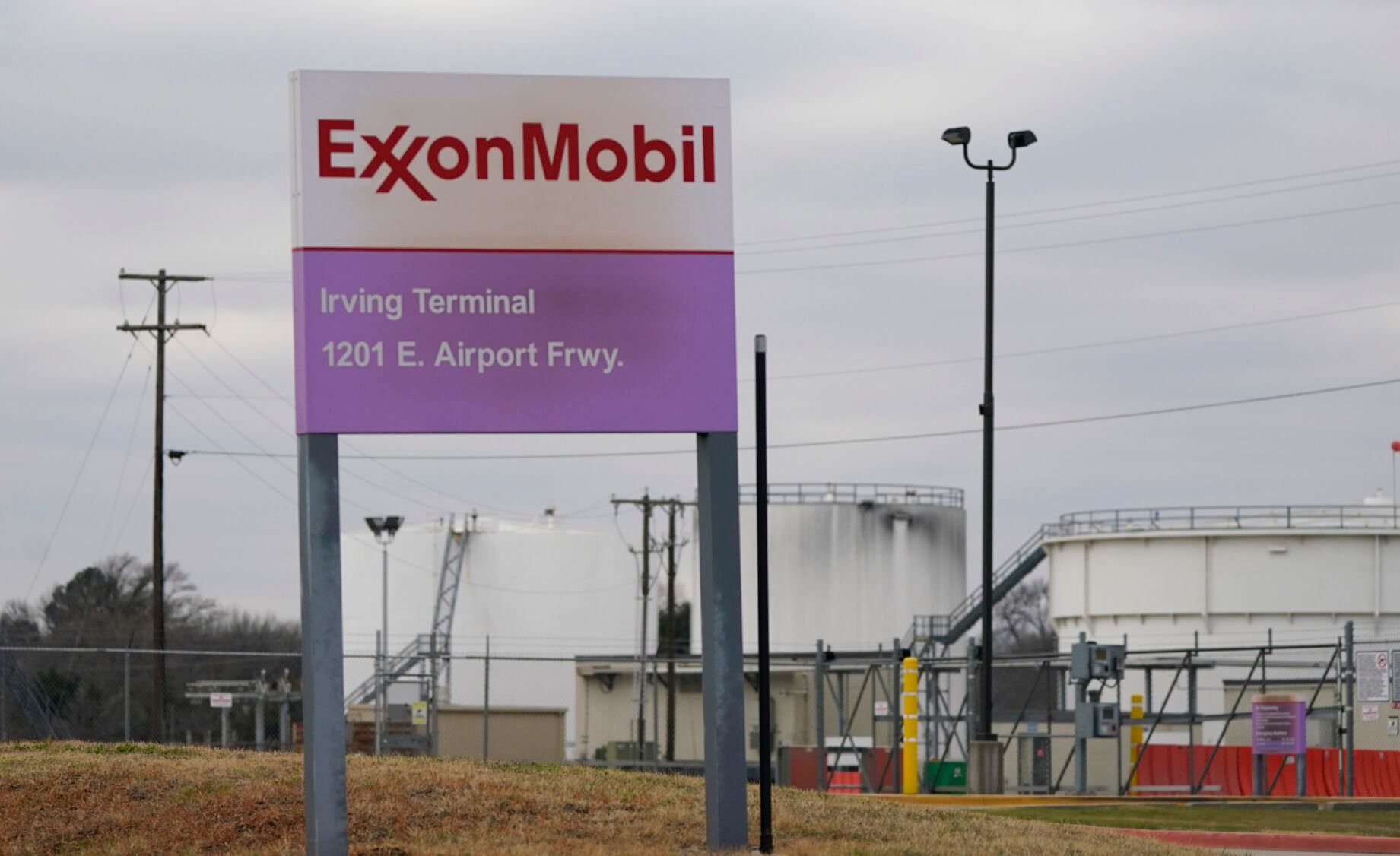 <p>File - A sign marks the entrance to an ExxonMobil fuel storage and distribution facility in Irving, Texas, Jan. 25, 2023. (AP Photo/LM Otero, File)</p>   PHOTO CREDIT: LM Otero 