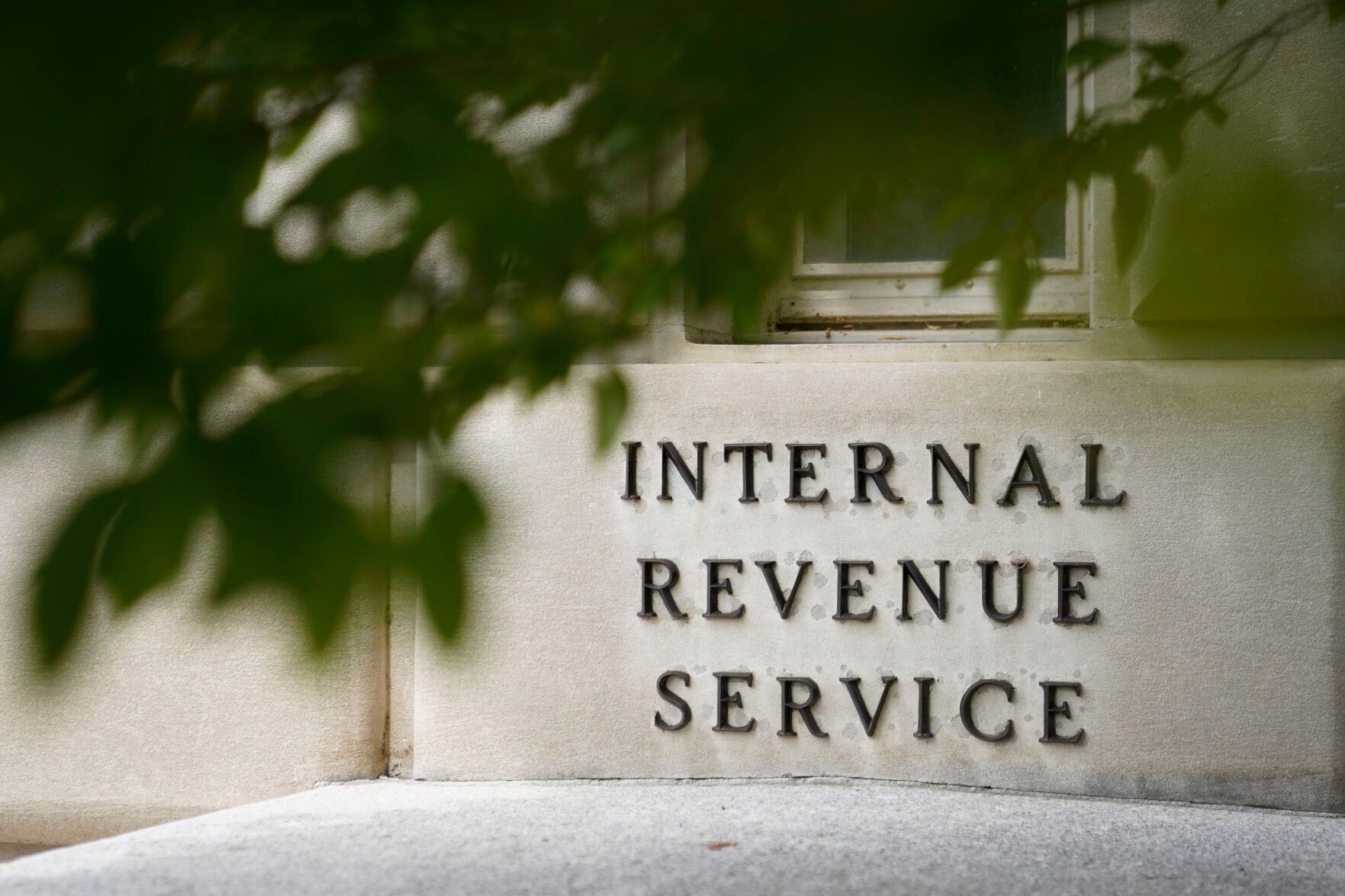 <p>FILE - A sign is displayed outside the Internal Revenue Service building on May 4, 2021, in Washington. (AP Photo/Patrick Semansky, File)</p>   PHOTO CREDIT: Patrick Semansky 