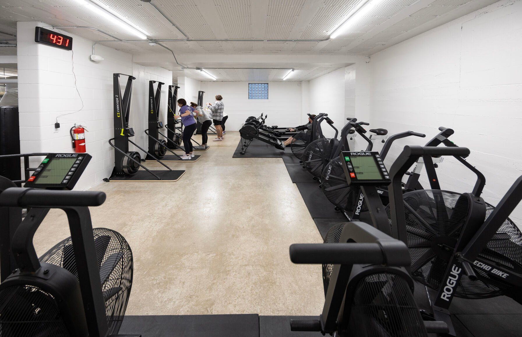 A class uses exercise equipment at Impact Fitness, 475 N. Water St, in Platteville, Wis., on Thursday.    PHOTO CREDIT: Gassman