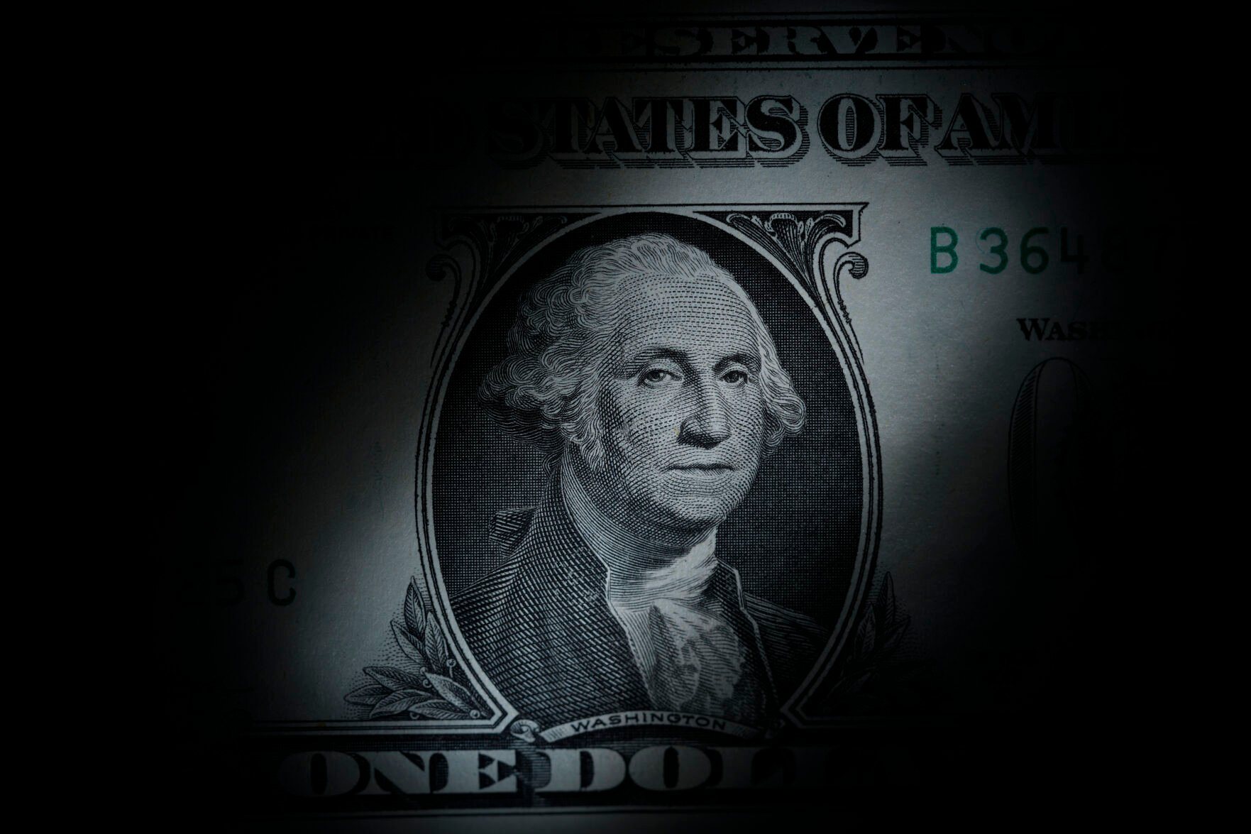 <p>FILE - The likeness of George Washington is seen on a U.S. one dollar bill, Monday, March 13, 2023, in Marple Township, Pa. (AP Photo/Matt Slocum, File)</p>   PHOTO CREDIT: Matt Slocum 