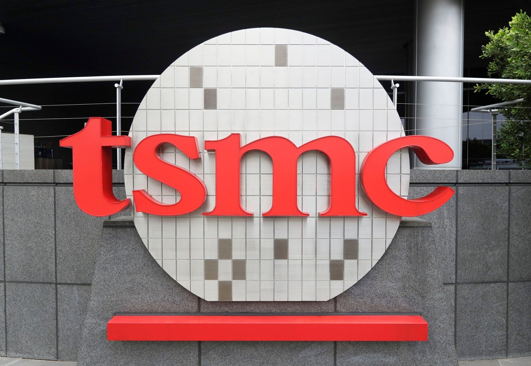 <p>FILE - Taiwan Semiconductor Manufacturing Co., Ltd. (TSMC) logo brands the headquarters in Hsinchu, Taiwan, Wednesday, Oct. 20, 2021. (AP Photo/Chiang Ying-ying, File)</p>   PHOTO CREDIT: Chiang Ying-ying 